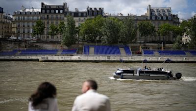 French sports minister takes a dip in the Seine ahead of Paris Olympics