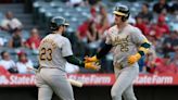 A's belt three homers, edge Angels in series opener