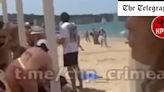 Ukrainian Atacms blows up over Crimean beach forcing sunbathers to flee as Russia claims five killed