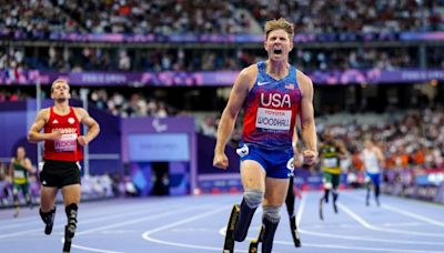 American Paralympic champion Hunter Woodhall drew ‘confidence’ from his wife’s Olympic gold medal