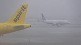 An airplane is seen on the runway as heavy rain falls over the Fort Lauderdale-Hollywood International Airport on Wednesday, June 12, 2024, in Fort Lauderdale, Florida.