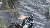 Video shows Ukrainian drone taking out a jet ski with 2 Russian soldiers who were attempting to cross the Dnipro River