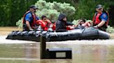 Southeast Texas flooding: photos capture water rescues of people and pets and severe damage to homes