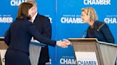 ...State Senator Jen Kiggans shake hands after the conclusion of their debate at the Marriott Virginia Beach Oceanfront in Virginia Beach, Virginia, on Oct...