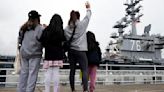 Navy flagship carrier leaves its Japan home port