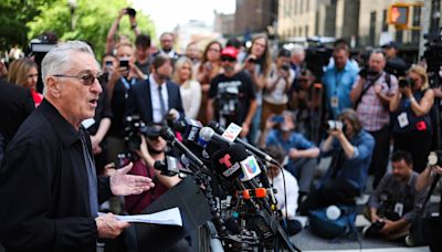 Robert De Niro clashes with Trump supporters outside court