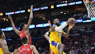 LeBron James and the Lakers secure a playoff berth with 110-106 win over the Pelicans