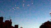 Stunned onlookers watch as mysterious UFOs swoop across Britain