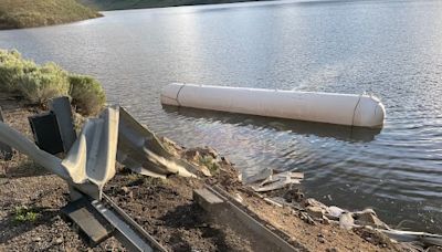Jackknifed semi-truck crashes into Deer Creek Reservoir