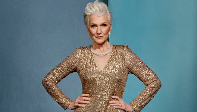 SI Swimsuit Legend Maye Musk Shines in Gold Sequined Gown
