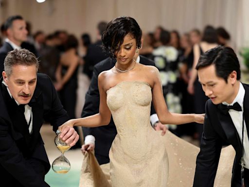 Tyla Gets Lifted Up the 2024 Met Gala Steps in Her Form-Fitting Sand Dress