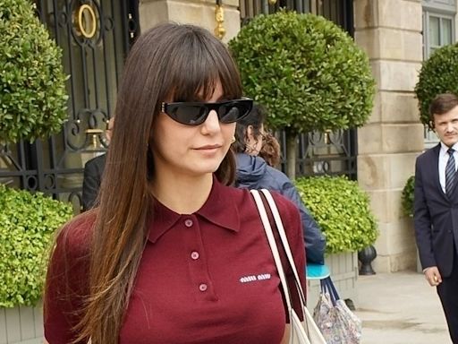 Nina Dobrev looked stylish in Paris with a knee brace and cane