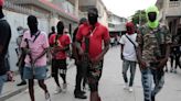 Fresh gang violence traps over 100 school children in Haiti for a second day