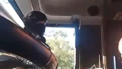 Moment Sinaloa Cartel members warn bus riders of impending violence