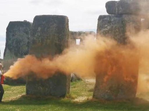 Activists spray Stonehenge in orange paint, demand end of fossil fuel use