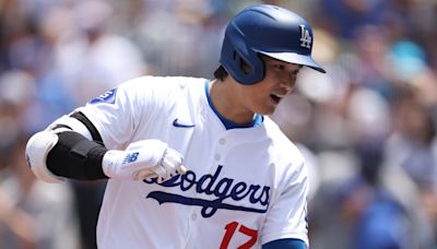 Shohei Ohtani punctuates Dodgers sweep of Braves with 2 home runs to tie MLB lead