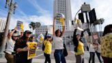 Los Angeles Times staffers stage walk-out to protest impending layoffs