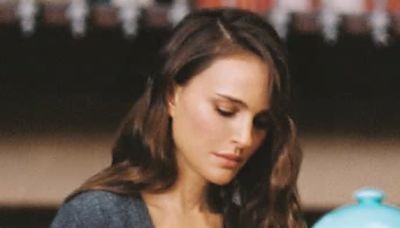 Natalie Portman is casually chic in denim jeans and gray cardigan as she stars in Dior's latest Book Tote Club segment... one month after finalizing divorce from Benjamin Millepied