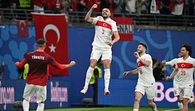 Merih Demiral scores twice as Turkey advances to Euro 2024 quarterfinals with victory over Austria in frenzied atmosphere