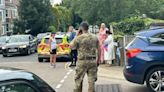 Soldier in uniform stabbed in frenzied attack by masked man outside barracks