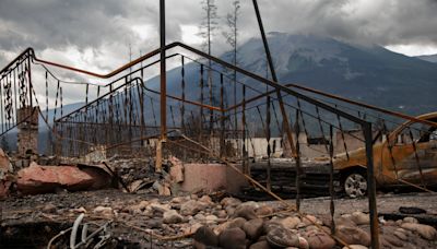 'Amidst the ashes, life finds a way': Before and after Jasper wildfire photos depict extent of damage to village nestled in Canada's natural crown jewel