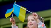 Ukraine arrives at Euro 2024 to a patriotic welcome and vivid reminder of the war at home