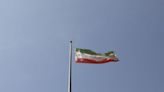 Cleric killed in restive Iranian city, protests rage on