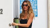 Gisele Bundchen bares taut midriff as she gets back to her gym routine