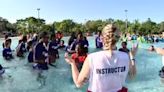 Disney’s Typhoon Lagoon holds World’s Largest Swimming Lesson event for students