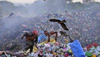 ‘They don’t know if they’ll survive’: The Indian garbage pickers working through extreme heat