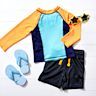 Comfortable and durable outfits designed for everyday play and activities. Often made from soft fabrics and easy to wash.