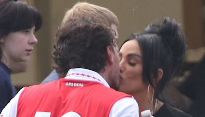 Katie Price shares a kiss with boyfriend JJ Slater at football match