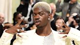 Lil Nas X Puts Modern Spin on Three-Piece Suit, Debuts Platinum Hair at Met Gala 2024