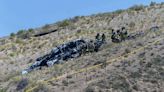 Military aircraft crashes near international airport in Albuquerque; pilot injured
