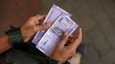 Fitch Sees India Rupee Rebounding to 82 Per Dollar on Bond Inflows