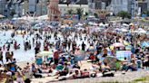 UK split in two as Met Office says half get 30C heatwave as others face downpour