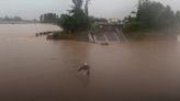 Bridge collapses into river as deadly floods ravage Brazil