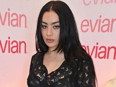 Charli XCX is giving centaur in boots that look just like horse hooves