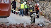 Four killed, dozens trapped in building collapse in South Africa