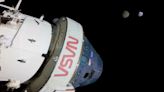 Nasa’s Orion capsule splash-lands in ‘textbook’ return to Earth from the Moon