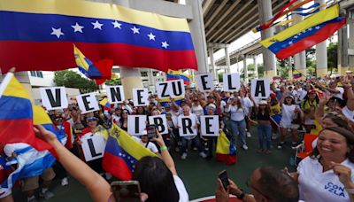 Venezuela election goes beyond closing time, Maduro's rivals tally votes