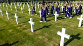 St. Aug Marching 100 performed at D-Day commemoration in France; watch the band warm up