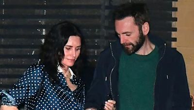 Courteney Cox, 59, looks effortlessly chic in a silk polka dot shirt as she enjoys date night with partner Johnny McDaid, 47, at Nobu Malibu