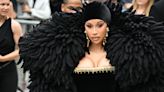 Cardi B Is Striking in a Huge Feathered Cape and Velvet Gown