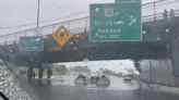 Rhode Island flooding: Buildings collapse and cars submerged as storms batter half of US