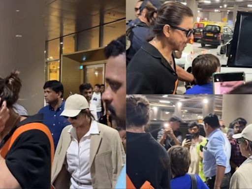 Shah Rukh Khan escorts Gauri Khan to their car as they return with son AbRam Khan from London. Watch