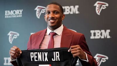 Kirk Cousins and Michael Vick give Penix Jr. a 'warm welcome' to Atlanta after being surprisingly picked by the Falcons