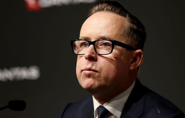 Former Qantas boss has exit pay slashed by millions