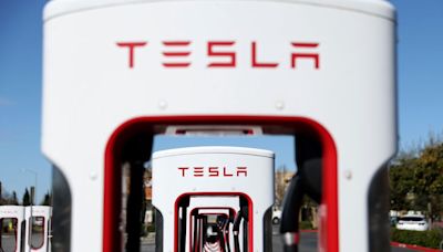 Musk Undercuts Tesla Chargers Biden Had Lauded as ‘a Big Deal’