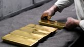 Gold slides on trimmed US rate cut bets, rallying equities